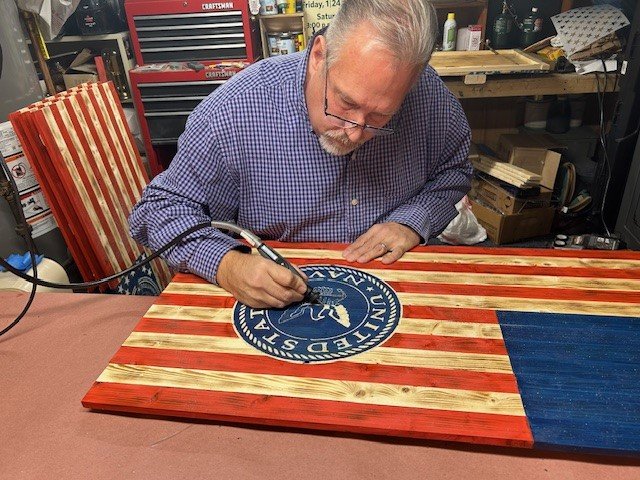 Keith Rowe working in the workshop